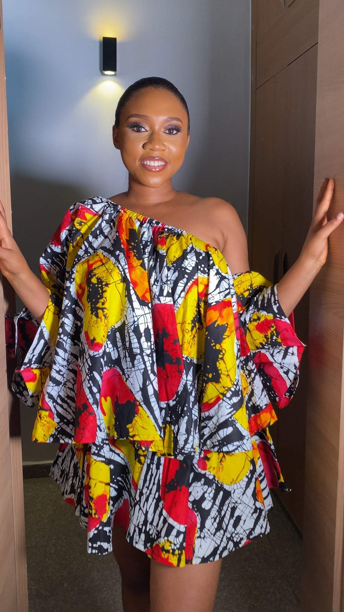 Didi 2 piece Flair skirt and one shoulder mid sleeve Top